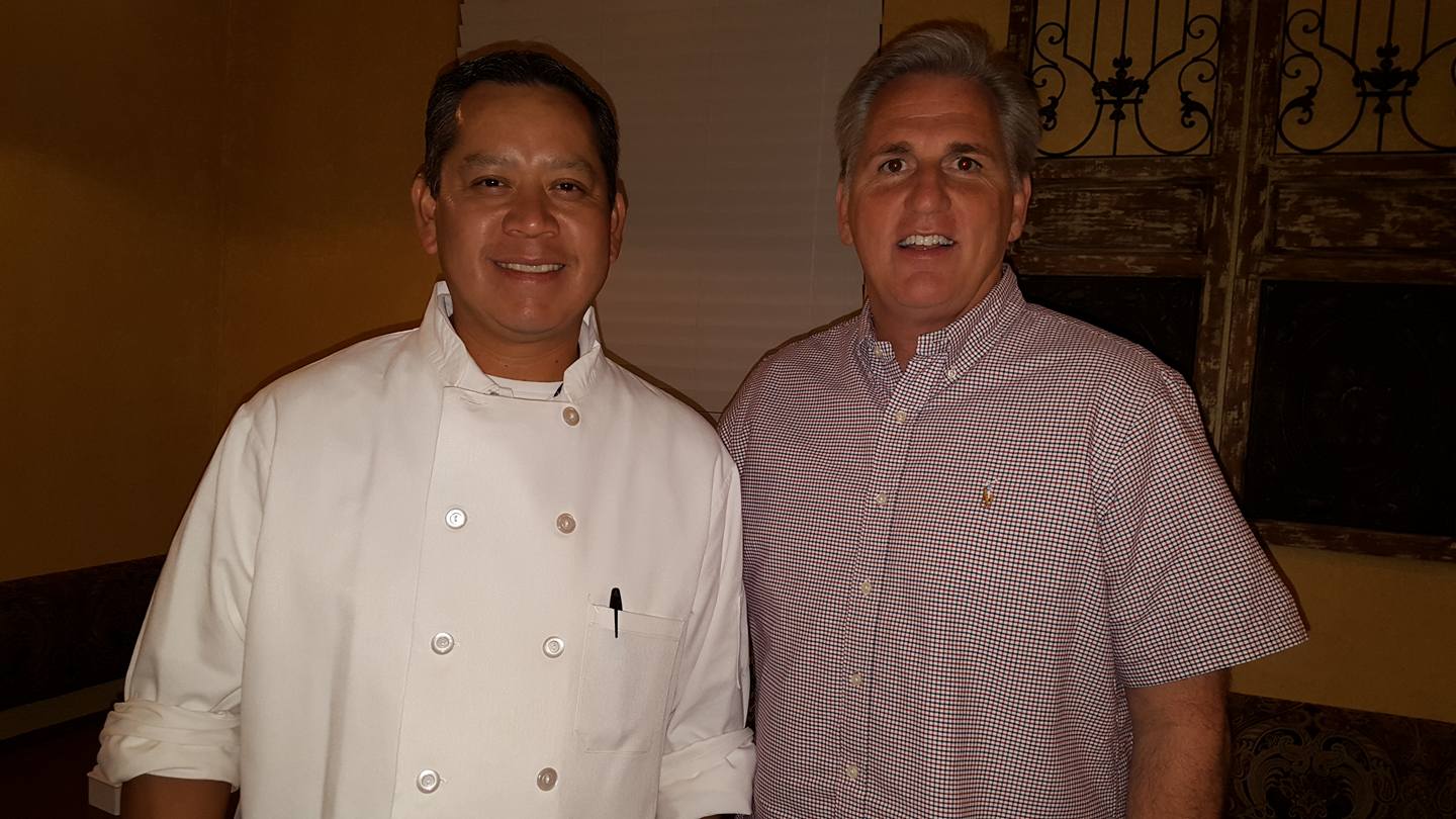 Sorella's chef with a guest